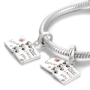 925 zilveren slangenarmband met kristallen boekhangers en romantische tekst