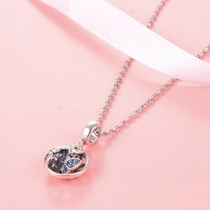 Pendentif papillon rétro en argent sterling 925 avec pierres bleues et design ajouré