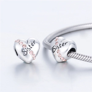 S925 sterling zilveren hartbedeltje met Sister gravure en roze strassteentjes armband