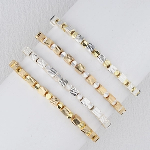 Elastic metal cube bead bracelets for women in polished gold and silver finishes