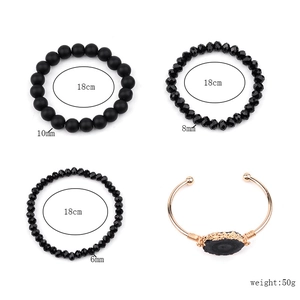 Ensemble de 4 bracelets en cuivre doré avec pierres naturelles noires et jonc ouvert