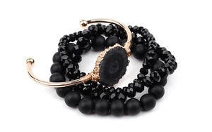Parure de 4 bracelets bohèmes en cuivre doré avec pierre noire naturelle et perles