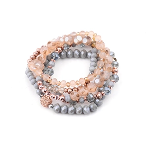 Set di bracciali multistrato stile boho con cristalli rosa e ciondoli a sfera pavé