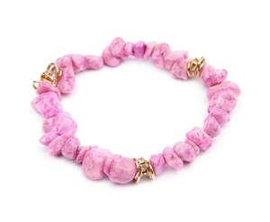 Detail view of pink irregular natural stone beads with gold rhinestone spacers on bracelet