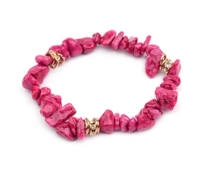 Detail of pink crystal chips beaded bracelet with gold rhinestone-studded metal spacers