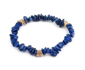 Detailed macro of natural lapis lazuli beaded bracelet with gold rhinestone accents