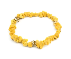 Close-up of yellow natural stone bead bracelet with crystal-set golden spacers