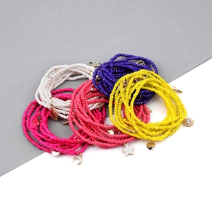 Multicolor Miyuki Tila seed bead layered bracelets with gold star moon love charms