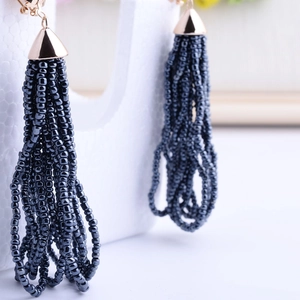 Pendientes hechos a mano de cuentas MIYUKI con flecos azul marino y tapas de metal dorado