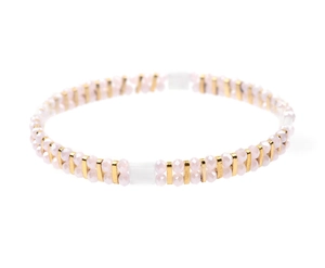 Close-up of double-layer pink beaded bracelet with gold spacers and white center bead