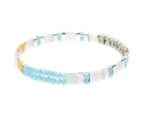 Detailed view of handmade Miyuki Tila bead bracelet with blue and silver faceted charms