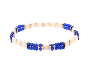 Detail of Miyuki Tila bead bracelet with blue facets, white tiles and golden spacers