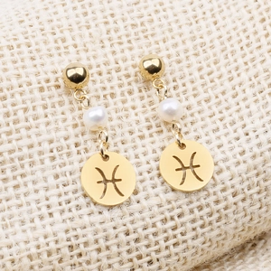 Boucles d'oreilles élégantes en acier doré avec perle blanche et pendentif signe Poissons