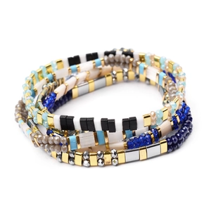 Bohemian multilayer Tila bead bracelet set in blue, white and gold with metallic spacers