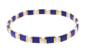 Detail of handmade square Tila bead bracelet with blue, white and gold tiles