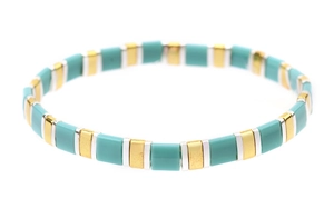 Detail of turquoise and gold Tila bead stretch bracelet with square enamel tiles