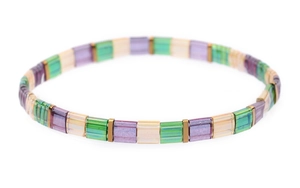 Detail view of colorful Tila bead bracelet featuring polished gold-tone metal spacers