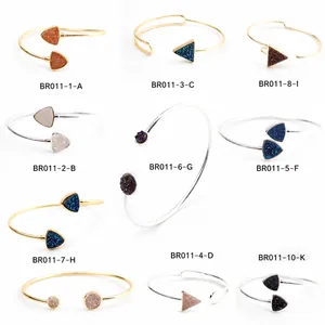 Set of bohemian open cuffs featuring colorful druzy crystals in gold and silver finish