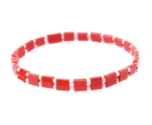 Detail of Miyuki Tila beaded bracelet featuring red rectangular beads and white accents