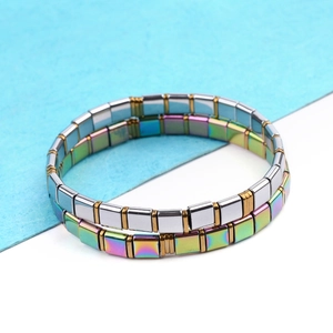 Close-up of dual-strand Tila bead bracelets with iridescent and silver metallic squares