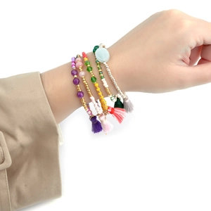 Five-piece set of colorful bohemian crystal beaded bracelets with tassel charms for women