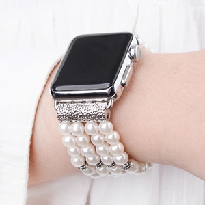 Elegant Apple Watch band with triple-row natural crystal pearls and silver floral connectors