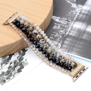 Detail of four-row crystal pearl beads and gold textured connectors for Apple Watch strap