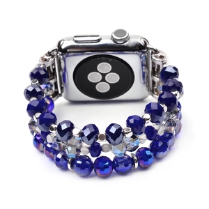 Detailed macro view of triple-row navy blue crystal beaded Apple Watch fashion strap