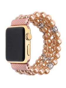 Detail of three-row champagne pearl Apple Watch strap with rose gold connectors
