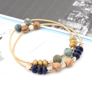 Bohemian double-layer bracelet set with golden spring coils, natural stone and wood beads