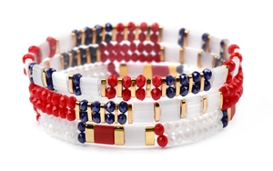 Detail of multi-layer beaded bracelet with red white blue crystal and gold metal spacers