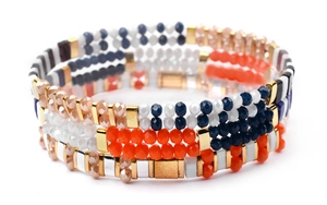 Detail of bohemian multilayer Miyuki Tila beaded wrap bracelet with colorful crystal beads