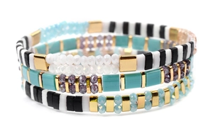 Detail view of multi-layer Bohemian beaded bracelet set with colorful Tila and crystal beads