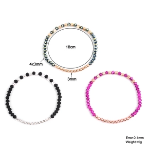 Three-piece beaded bracelet set with grey, black, and pink stones and metallic beads