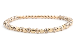 Detail of beaded bracelet with faceted champagne crystals and gold metallic beads