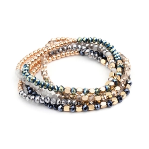 Detail of multi-layered beaded bracelets with crystal glass and metallic hematite beads