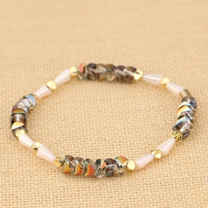 Bracciale di perline in cristallo da donna con gemme rosa sfaccettate e perle dorate