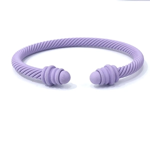 Detailed view of light purple matte cable twisted open bracelet with spherical ends