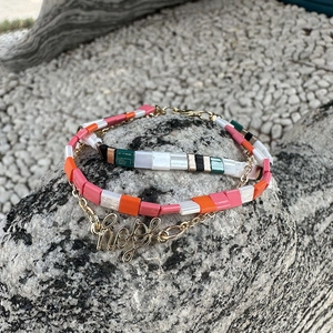 Three-piece Bohemian Tila bead bracelet set featuring colorful tiles and HOPE charm