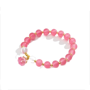 Bracciale mughetto in quarzo rosa con perline dorate e pendente floreale elegante