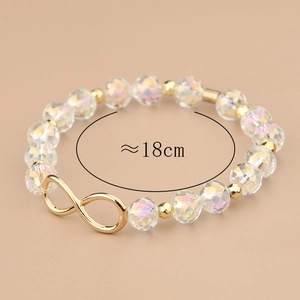 Gefacetteerde kristallen armband met goudkleurig oneindigheidssymbool van 18cm lang