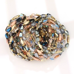 Faceted crystal bead bracelet with drop-shaped water droplets and metallic gold accents