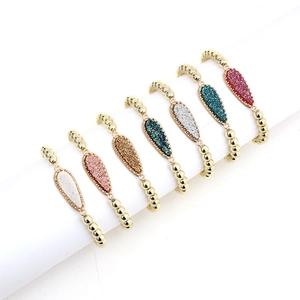 Set of 7 gold beaded bracelets for women featuring colorful druzy teardrop pendants
