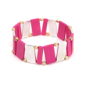 Detail of pink and silver rectangular beads on a handmade stretch miyuki geometric bracelet