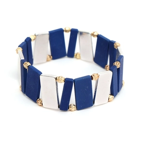 Detail of geometric blue matte and silver tiles stretch bracelet with gold bead accents