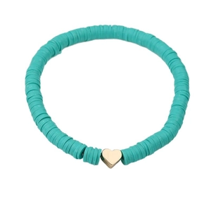 Bohemian heishi clay bead bracelet in turquoise with a gold heart charm on white background
