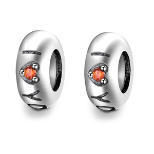 Detail of S925 silver charm bead featuring an orange heart stone and I love you engraving