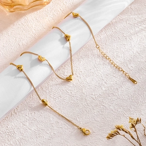 Set collana e orecchini a cuore dorato con zirconi incastonati in acciaio inossidabile