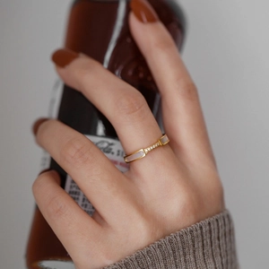 Minimalist rose gold titanium ring with white shell inlay and pavé zircon accents
