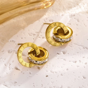 Pendientes dorados de lujo con números romanos y cristales brillantes engastados